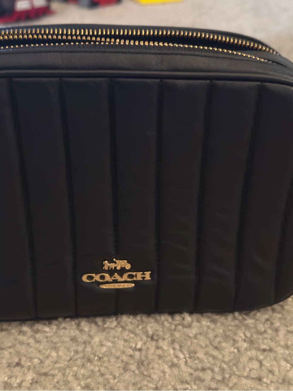 Coach Black Quilted Toiletry Bag with Gold Logo